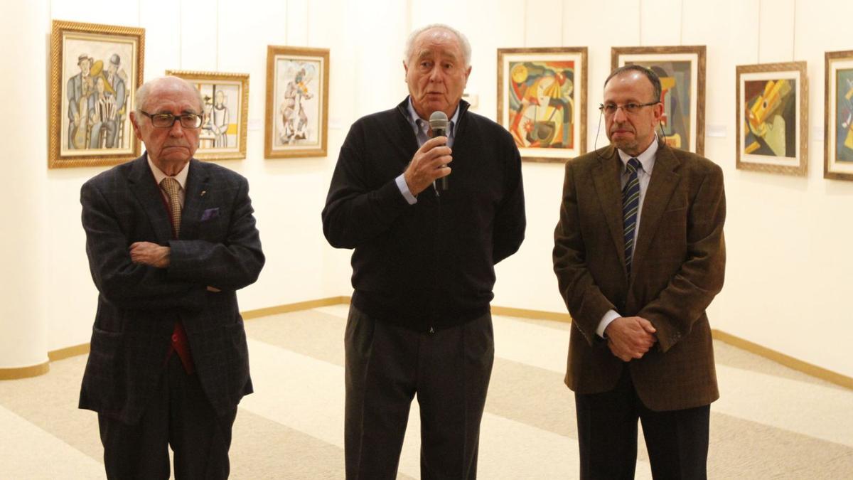Mariano Llobet, Pepe Roselló y Joan Serra en la exposicion de Elmyr de Hory en el Club Diario. 