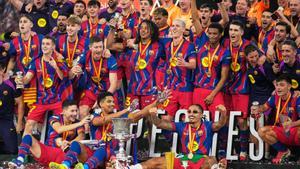 Barcelona players celebrate after winning the Spanish Super Cup final soccer match against Real Madrid at King Abdullah Sports City Stadium in Jeddah, Saudi Arabia, Sunday, Jan. 11, 2026. (AP Photo/Altaf Qadri)