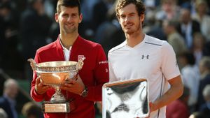 FILE - Serbias Novak Djokovic, left, and Britains Andy Murray holds their trophy after their final match of the French Open tennis tournament at the Roland Garros stadium, Sunday, June 5, 2016 in Paris.   (AP Photo/Alastair Grant, File)