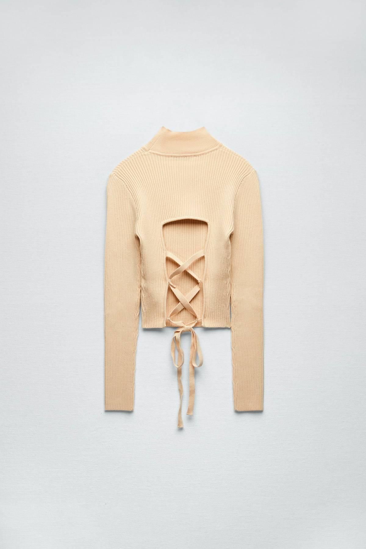 Jersey de punto con espalda abierta y tiras cruzadas, de Zara