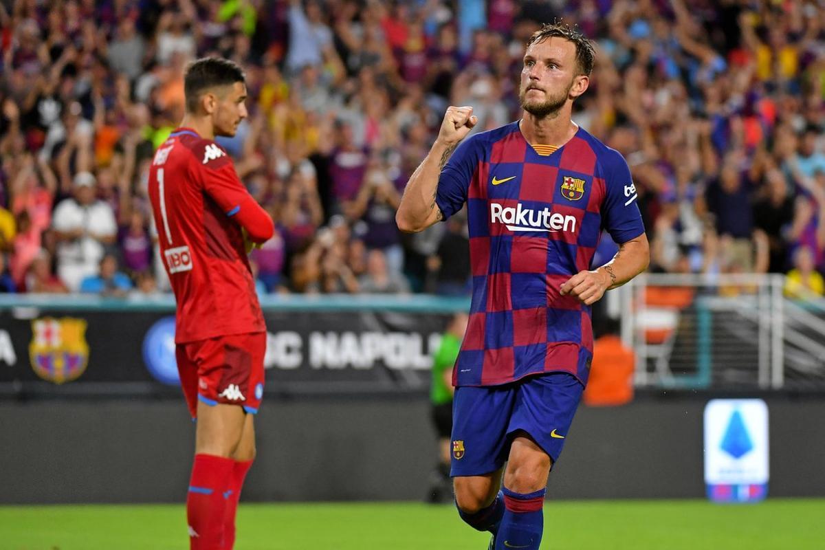 Aug 7, 2019; Miami, FL, USA; Barcelona midfielder Ivan Rakitic (4) celebrates after scoring a goal against Napoli during the second half of the United States La Liga-Serie A Cup Tour soccer match at Hard Rock Stadium. Mandatory Credit: Jasen Vinlove-USA TODAY Sports