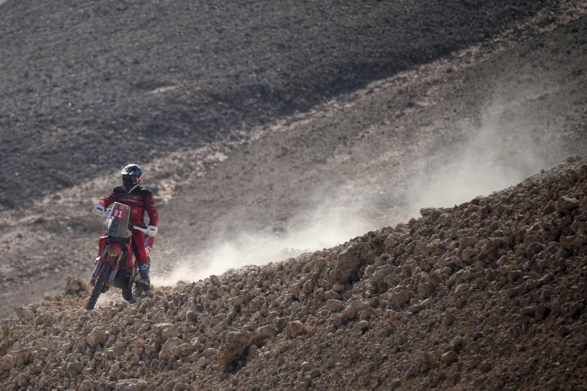 Rider Mike Wiedemann competes during the ninth stage of the Dakar Rally between Riyadh and Haradh, Saudi Arabia, Tuesday, Jan. 14, 2025. (AP Photo/Christophe Ena)