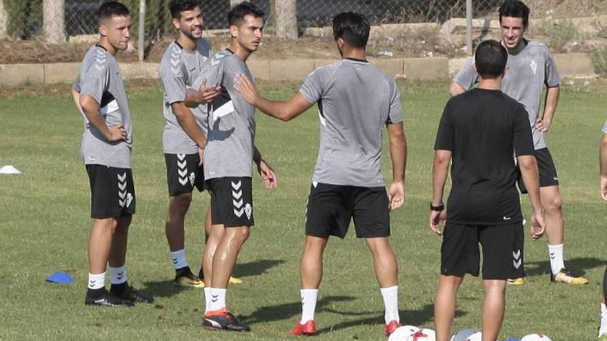 Aquino, José Ruiz, Armando y Forniés en un entrenamiento.