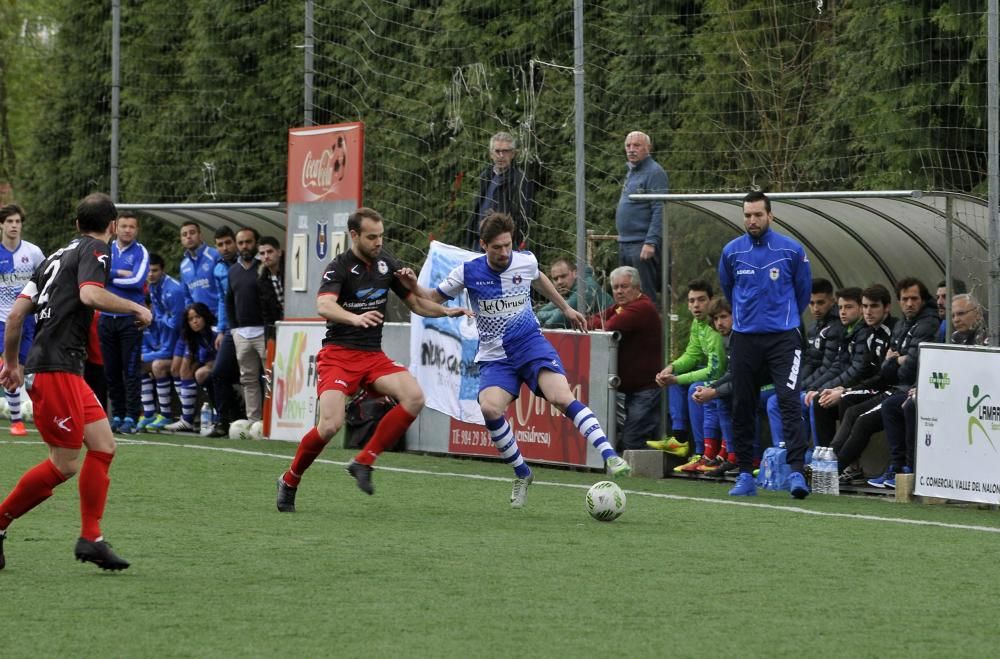 El partido entre el Tuilla y el Langreo, en imágenes