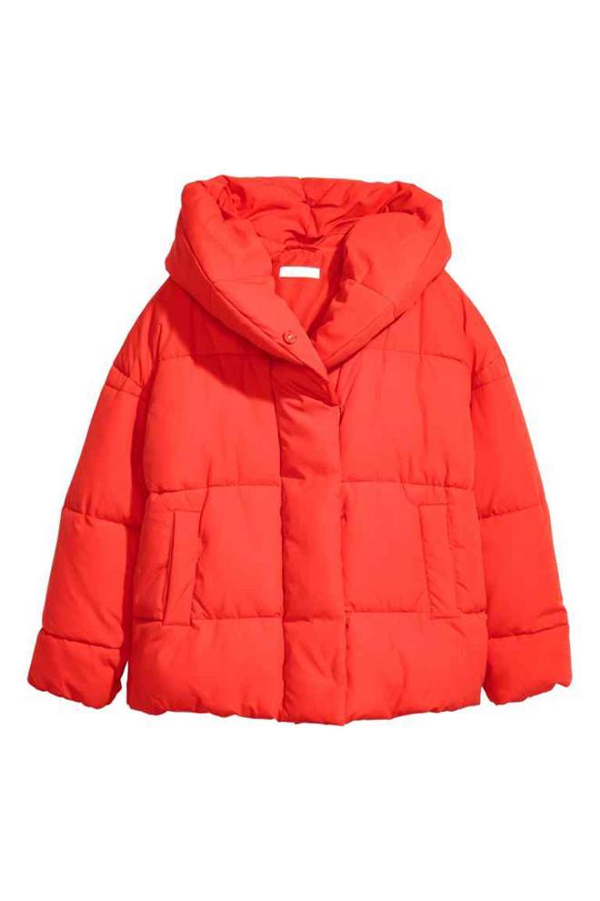 Plumífero naranja con cuello XL de H&M