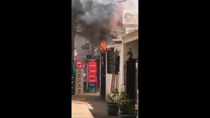 Incendio en El Palo de un taller de aluminio y forja