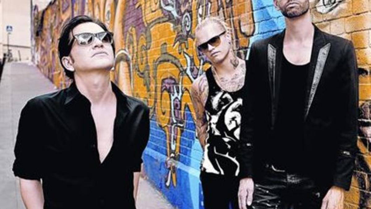 De izquierda a derecha, Brian Molko, Steve Forrest y Stefan Olsdal, integrantes de Placebo.