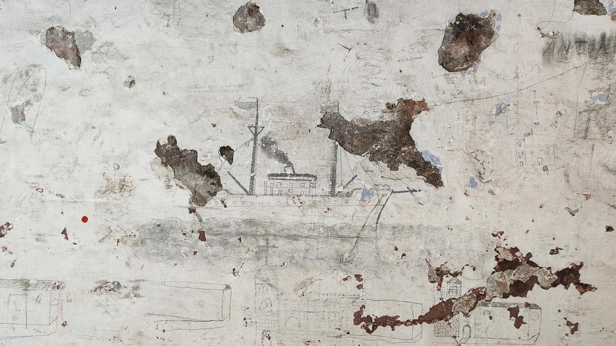 Uno de los grafitis de la antigua cárcel.