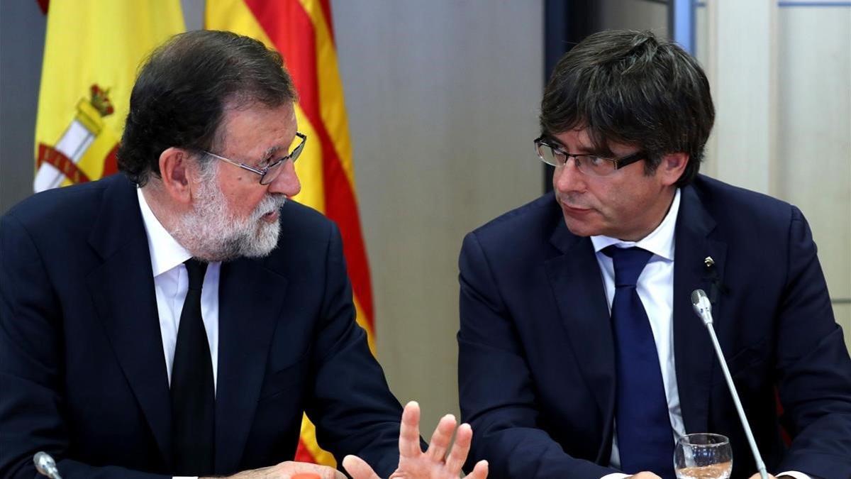 Rajoy y Puigdemont, en el 2017.