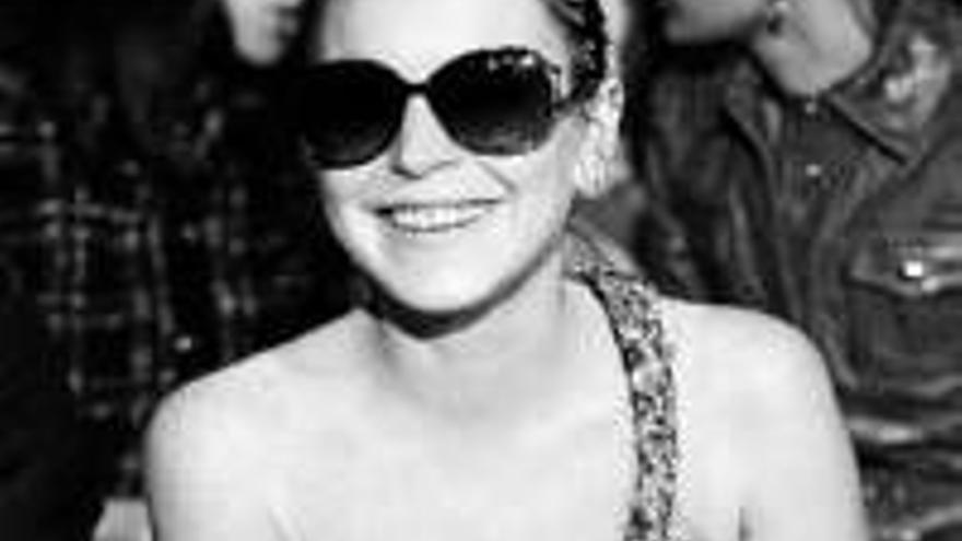 Lindsay Lohan: LA ACTRIZ SIGUE EL DESFILE DE ROBERTO CAVALLI EN MILAN