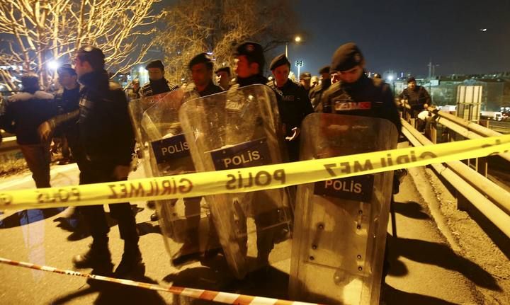 Riot police secure the blast scene in Istanbul