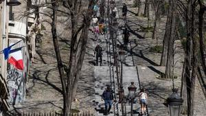 zentauroepp53033207 people go for a walk during a sunny day in montmartre in par200406182413
