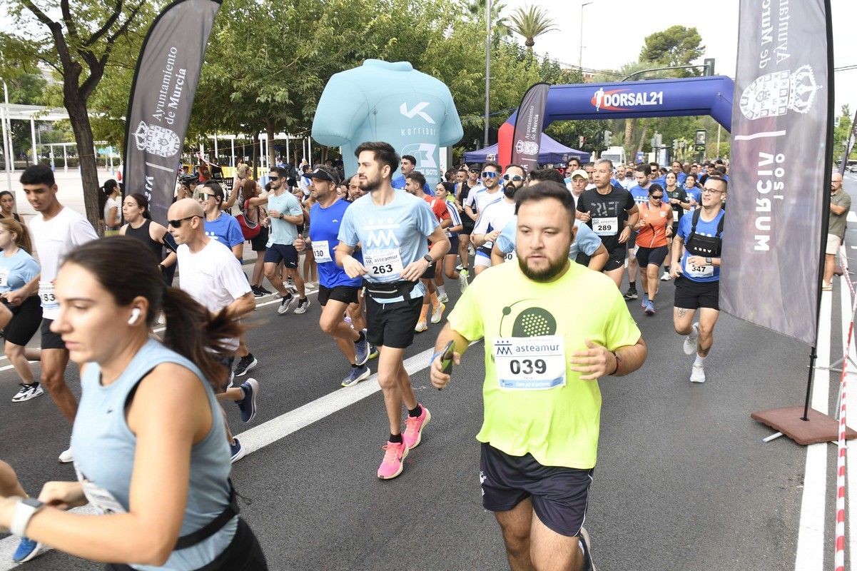La carrera y marcha Solidaria Asteamur, en imágenes