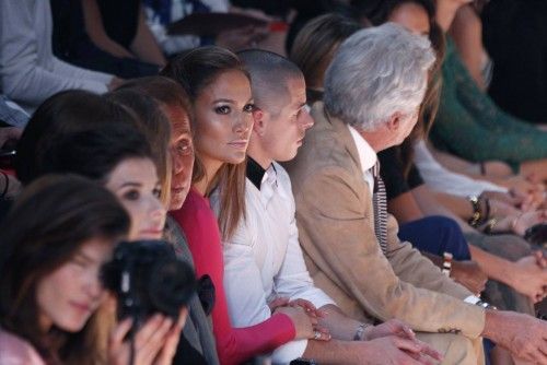 Fashion designer Valentino Garavani, actress and singer Jennifer Lopez and Casper Smart attend the Spring/Summer 2013 women's ready-to-wear fashion show for fashion house Valentino in Paris