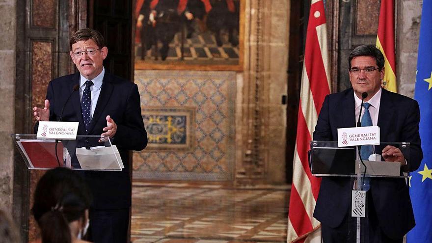 El presidente Puig y el ministro Escrivá, durante su comparecencia conjunta, ayer, en el Palau de la Generalitat.