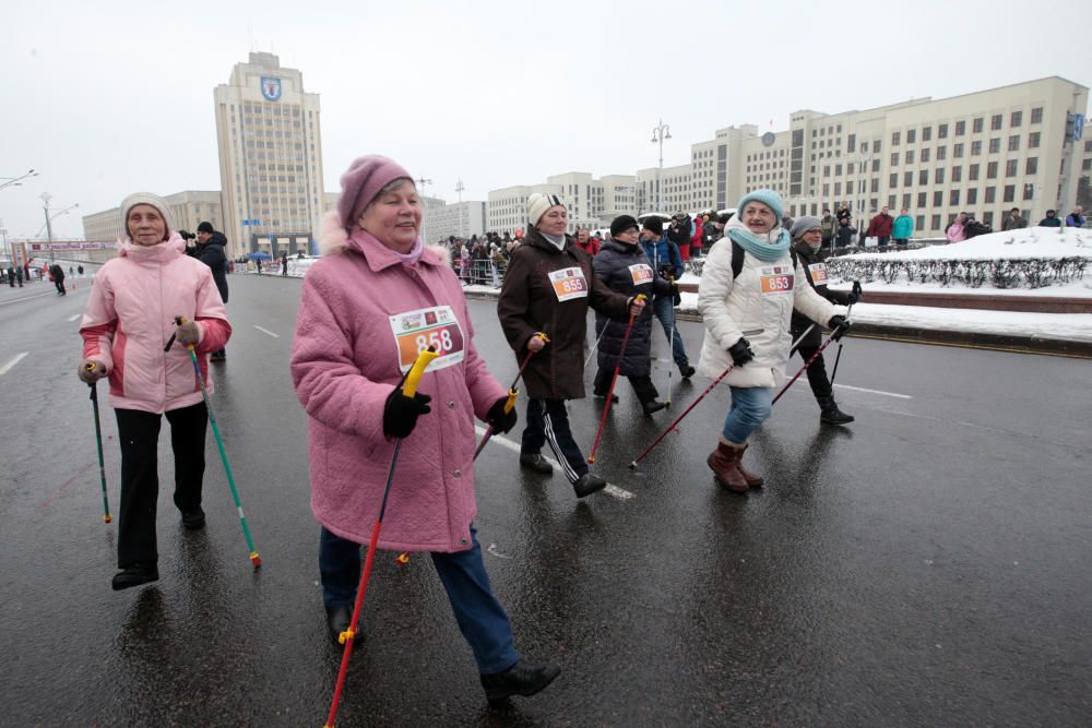 Women participate in the "Beauty Run" to mark ...