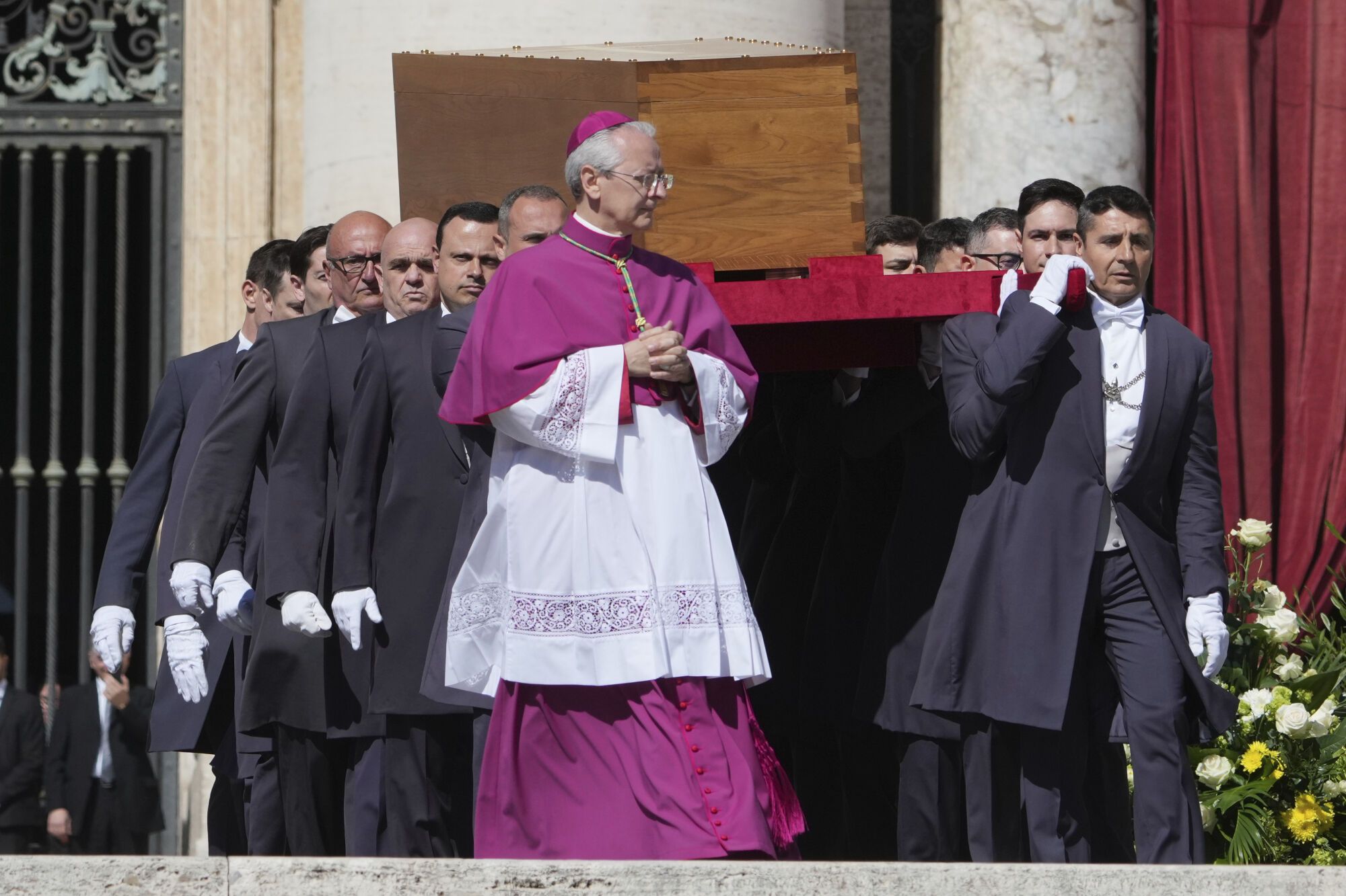 The coffin of Pope Francis is carried into St. Peter's Square during his funeral ceremony, at the Vatican, Saturday, April 26, 2025. (AP Photo/Alessandra Tarantino). EDITORIAL USE ONLY/ONLY ITALY AND SPAIN