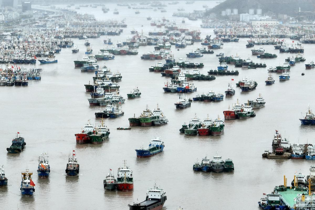 Vessels moored at a fishing port as Typhoon Muifa approaches, in Zhoushan