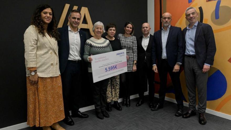 El acto de entrega del donativo de Abanca a Adicam.   | // M.F.