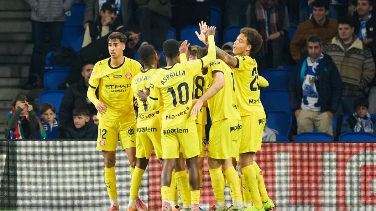 Els jugadors del Girona celebren un dels gols de divendres a Anoeta