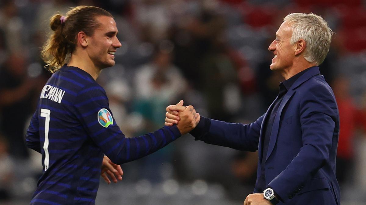 Griezmann y Deschamps, después de la victoria de Francia contra Alemania