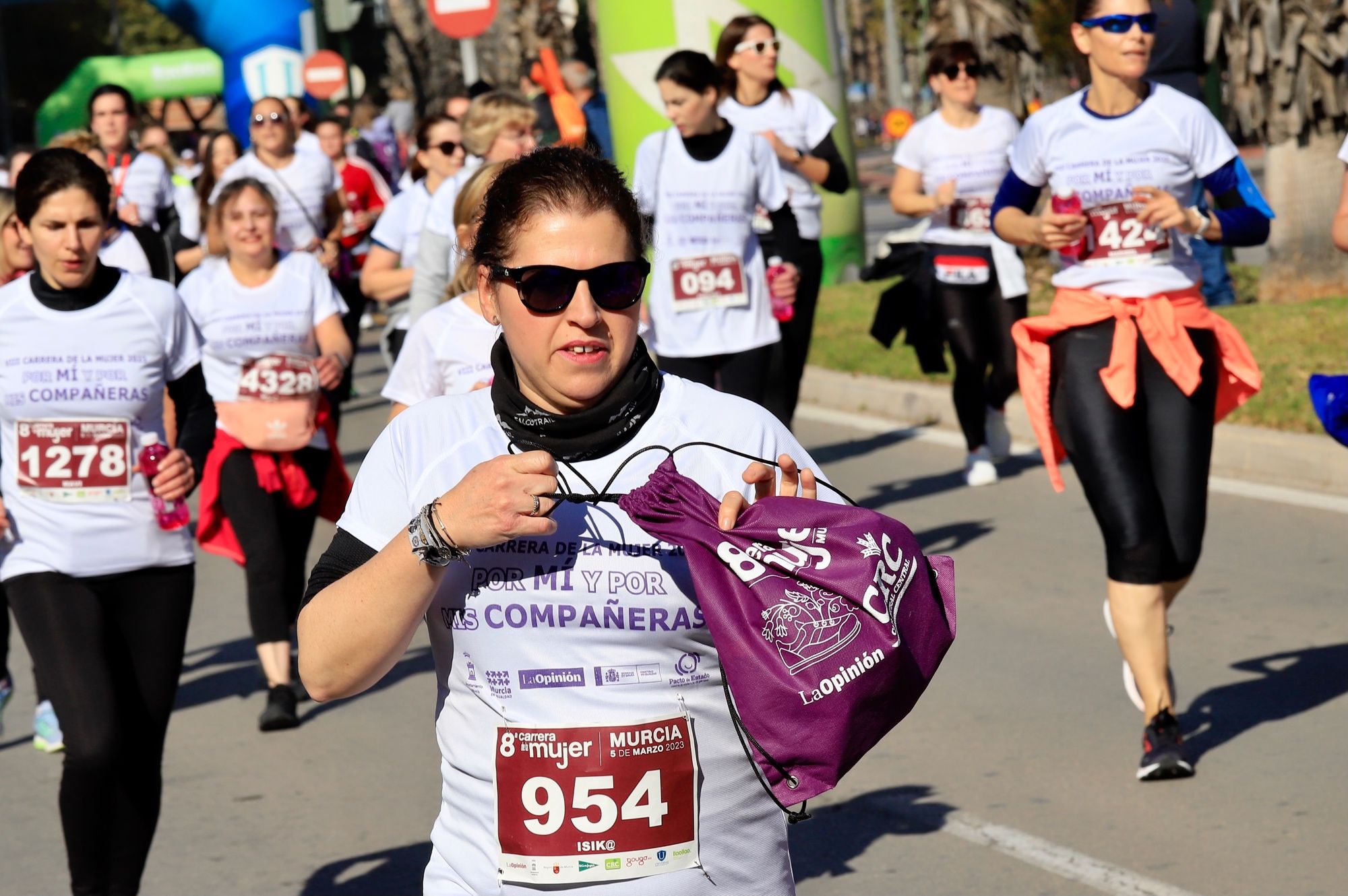 La salida y el recorrido de la Carrera de la Mujer 'inmortalizados' en imágenes