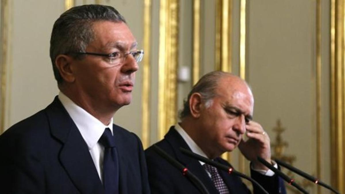 Alberto Ruiz-Gallardón y Jorge Fernández Díaz, este lunes, en la rueda de prensa tras conocer el fallo del TEDH contra la 'doctrina Parot'.