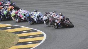 Spains rider Marc Marquez of the Ducati Lenovo Team steers his motorcycle followed by Italian rider Francesco Bagnaia of the Ducati Lenovo Team and Spains rider Alex Marquez of the BK8 Gresini Racing MotoGP during the MotoGP race of the Grand Prix of Italy at the Mugello circuit in Scarperia, Italy, Sunday, June 22, 2025. (AP Photo/Antonio Calanni)