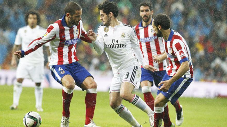 Un partido entre el Atlético y el Real Madrid.