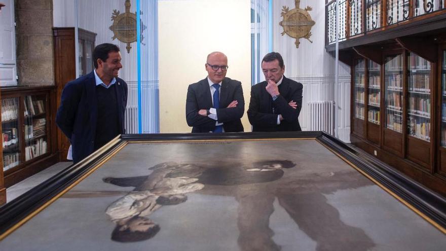 Cristian Moares, José Manuel Baltar y José María Vila Alén, ante la obra de Castelao, en la Diputación de Ourense.