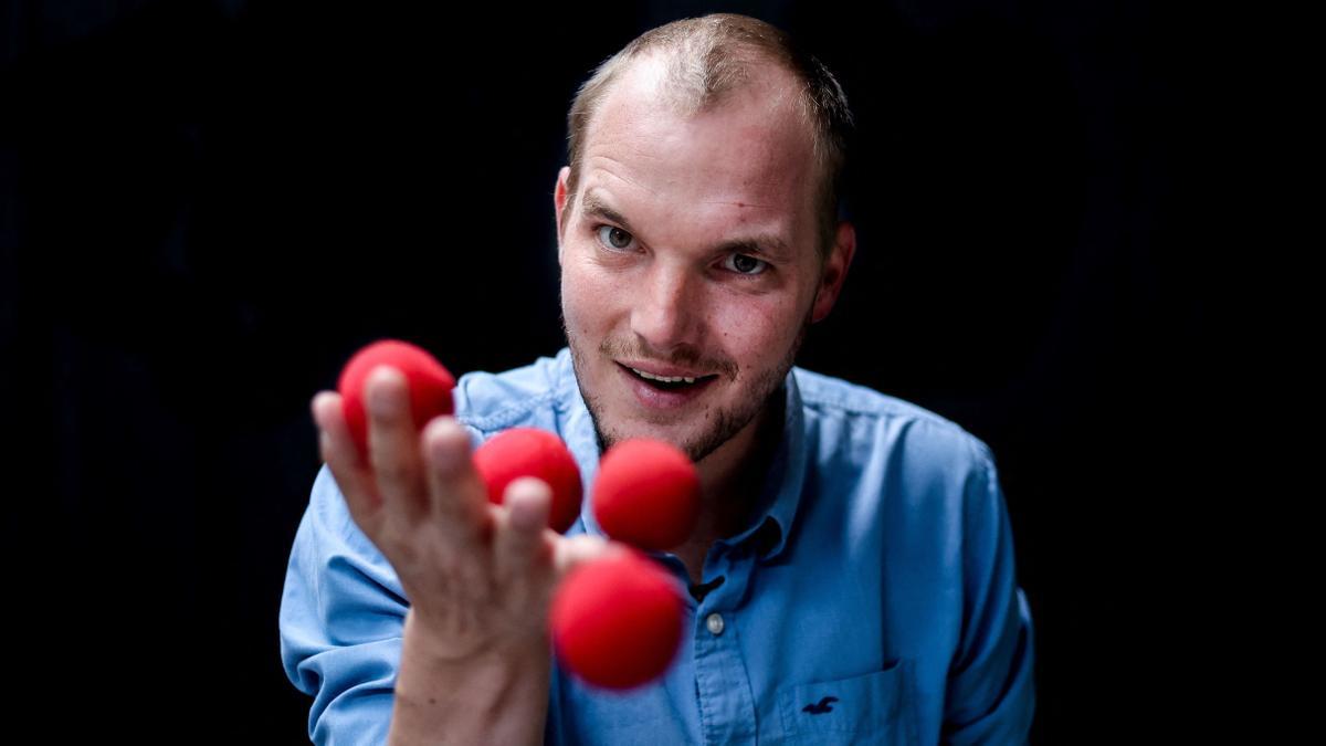 Belgian illusionist and 2022 World champion of Magic Laurent Piron poses in Soumagne near Liege on August 22, 2022. (Photo by Kenzo TRIBOUILLARD / AFP)