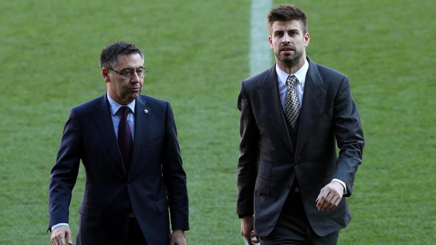 Gerard Piqué i Josep Maria Bartomeu en una imatge d&#039;arxiu del gener del 2018