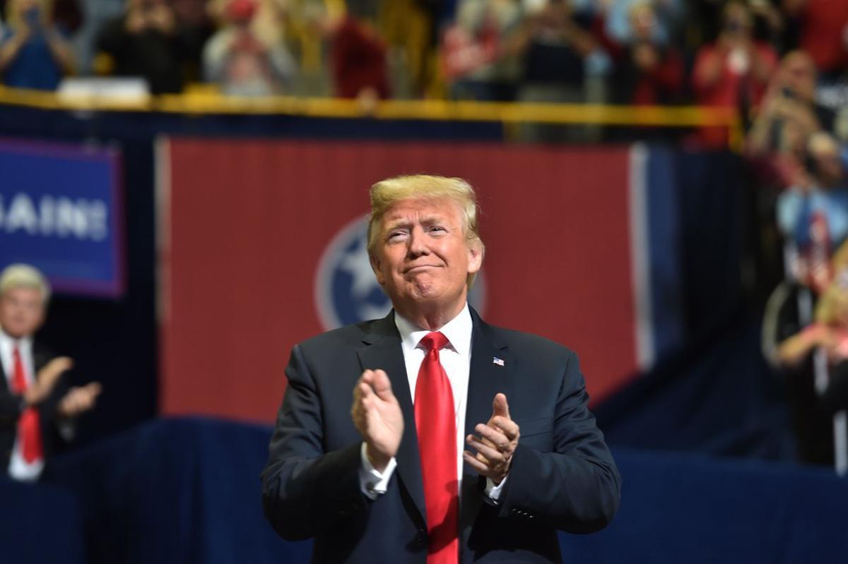 US President Donald Trump arrives for a  Make America Great Again  campaign rally at McKenzie Arena  in Chattanooga  Tennessee on November 4  2018   Photo by Nicholas Kamm   AFP