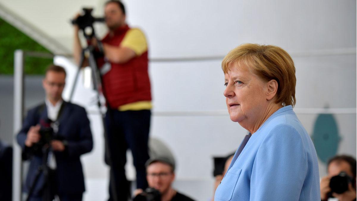 La economía alemana decrece en el segundo trimestre por la guerra comercial. En la foto, Angela Merkel.