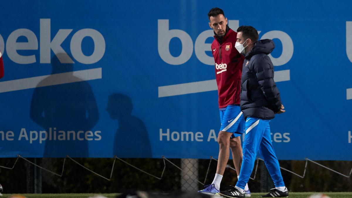 Xavi y Busquets, en una sesión de entrenamiento