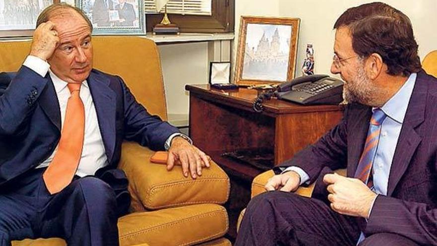 Rodrigo Rato y Mariano Rajoy en un encuentro anterior.