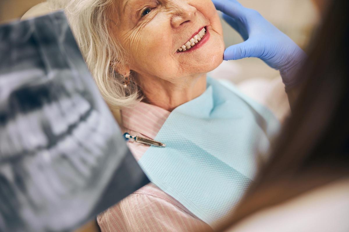 Teeth checkup at dentist clinic while woman smiling with white teeth