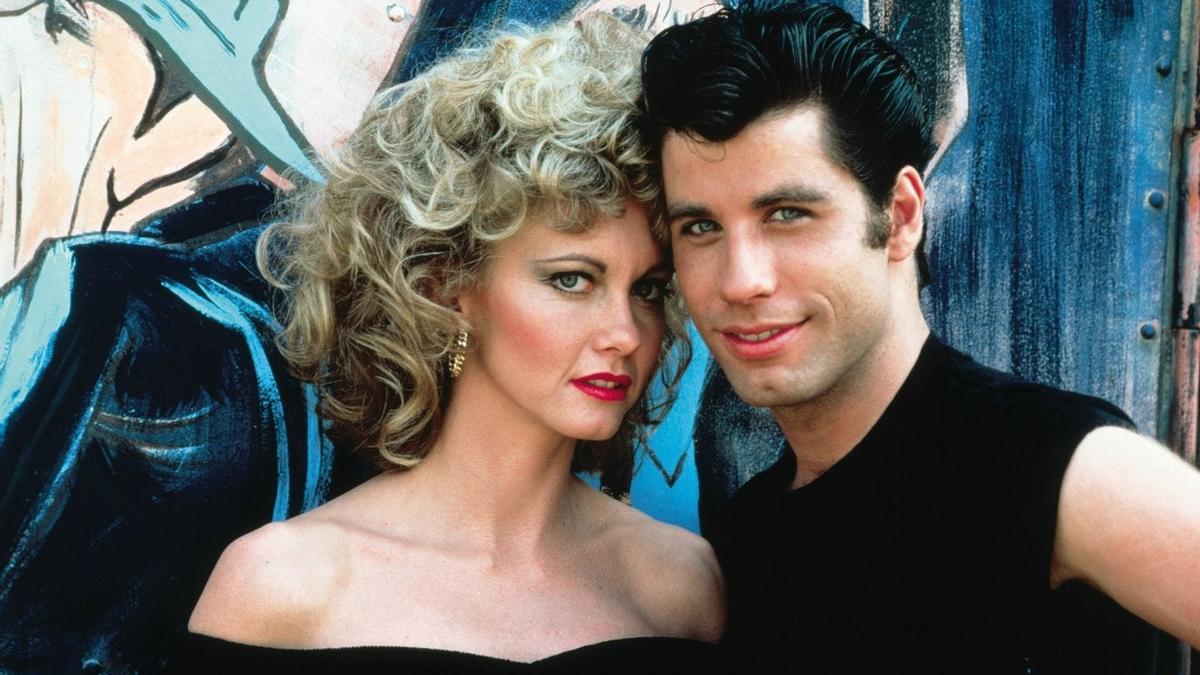 Olivia Newton John y John Travolta en la foto promocional de Grease