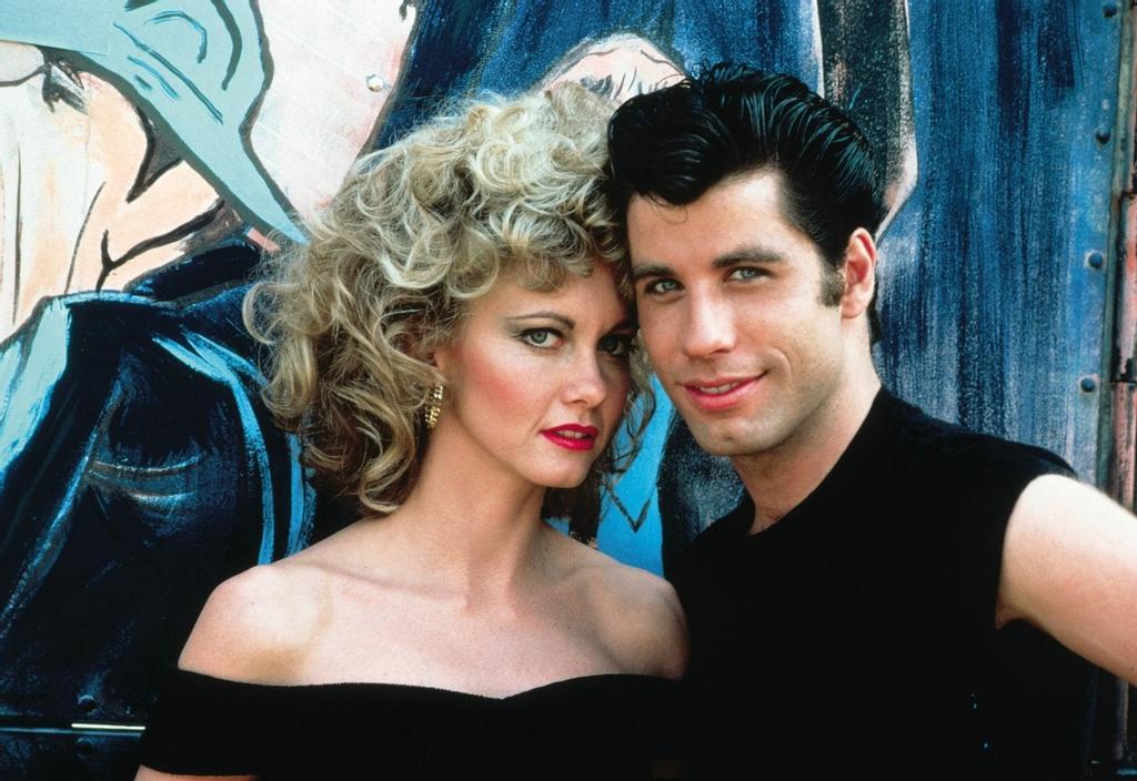 Olivia Newton John y John Travolta en la foto promocional de Grease