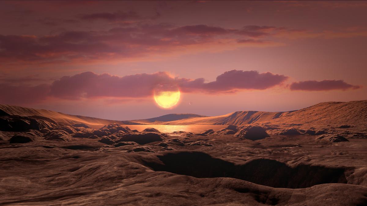 Concepción artística de un exoplaneta rocoso de la masa de la Tierra como Wolf 1069 b orbitando una estrella enana roja.