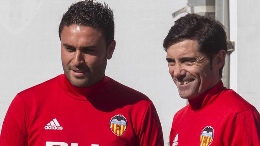 Marcelino con el técnico del filial Miguel Grau.