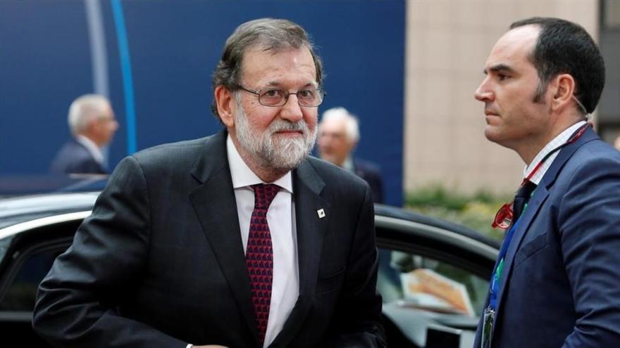 Macron y Merkel cierran filas con Rajoy en vísperas del 155