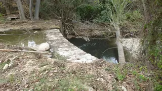 Las tormentas revientan un colector y causan un vertido al río Ríquer en Alcoy