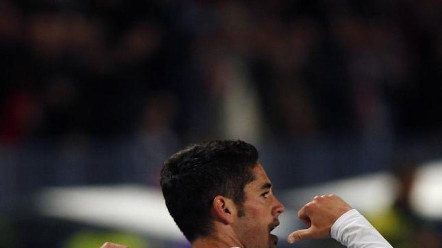 Isco celebra su gol ante el Oporto en los cuartos de final de la Champions.