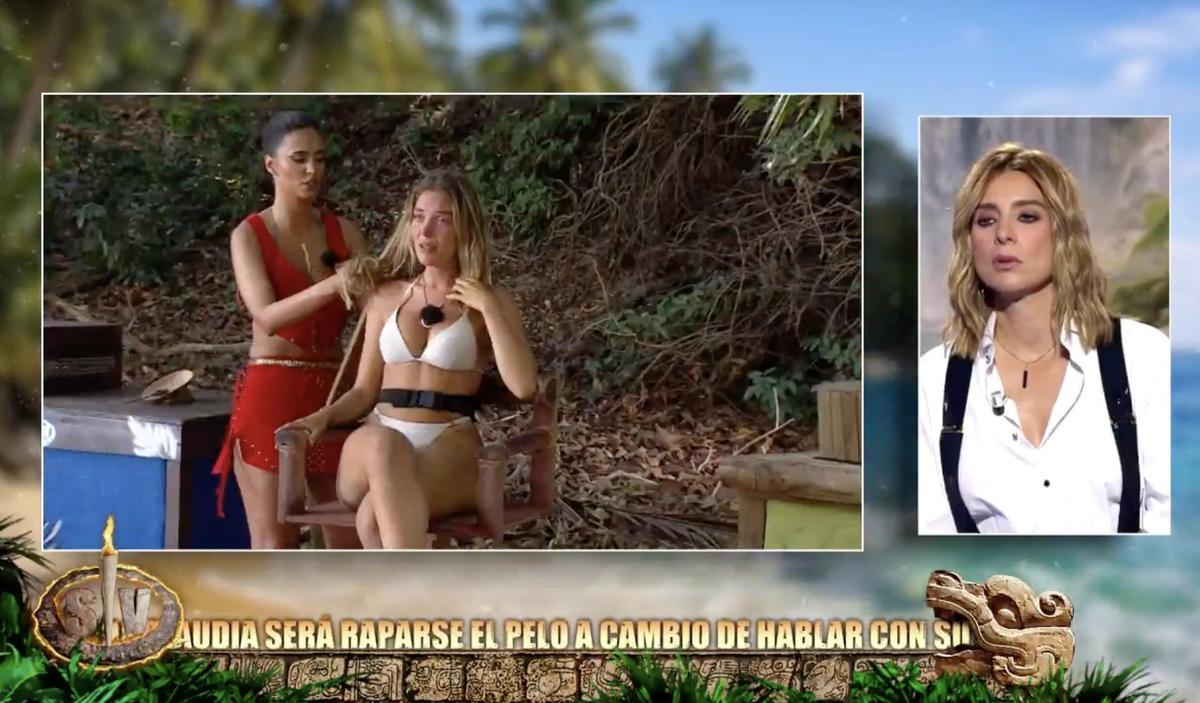 María Lamela, cortandole el pelo a Claudia en 'Supervivientes'