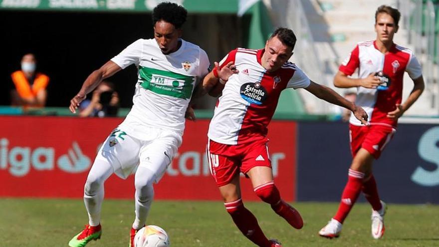 Aspas y Mojica, durante el partido de ida en el Martínez Valero