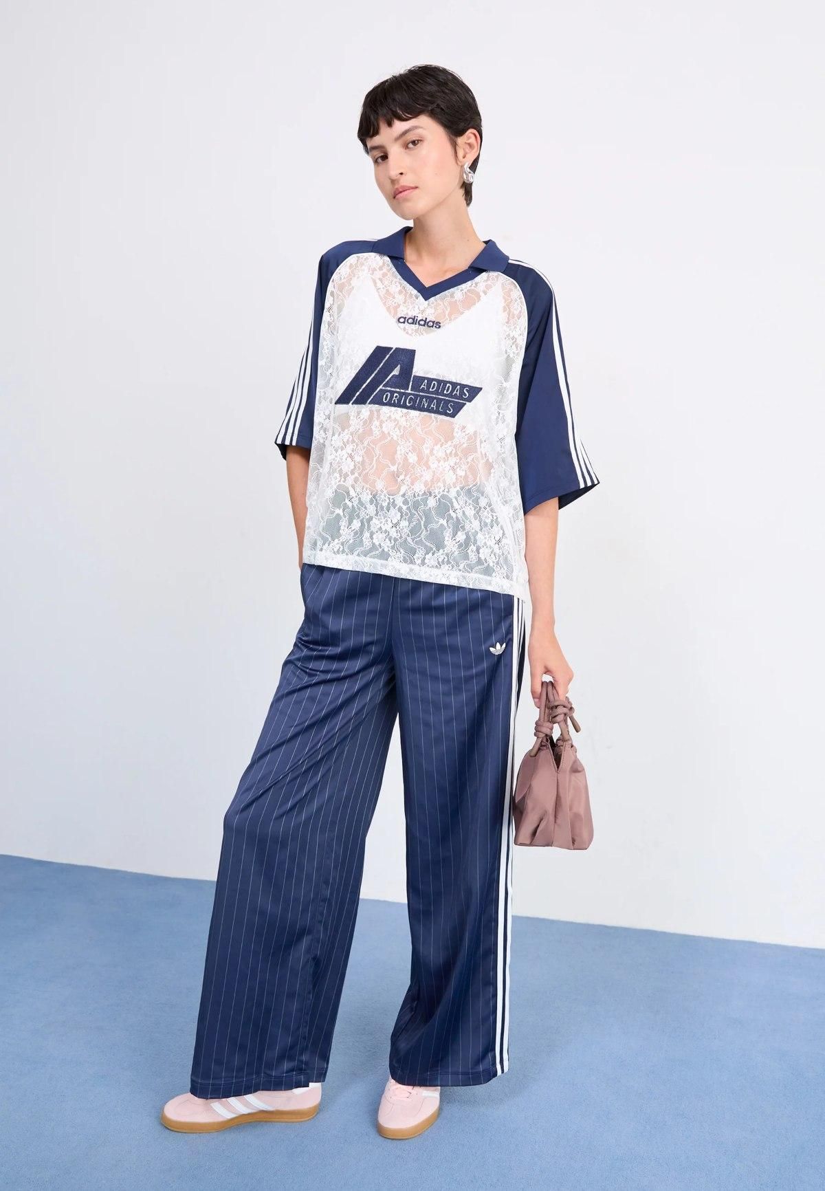 Look con piezas de Adidas