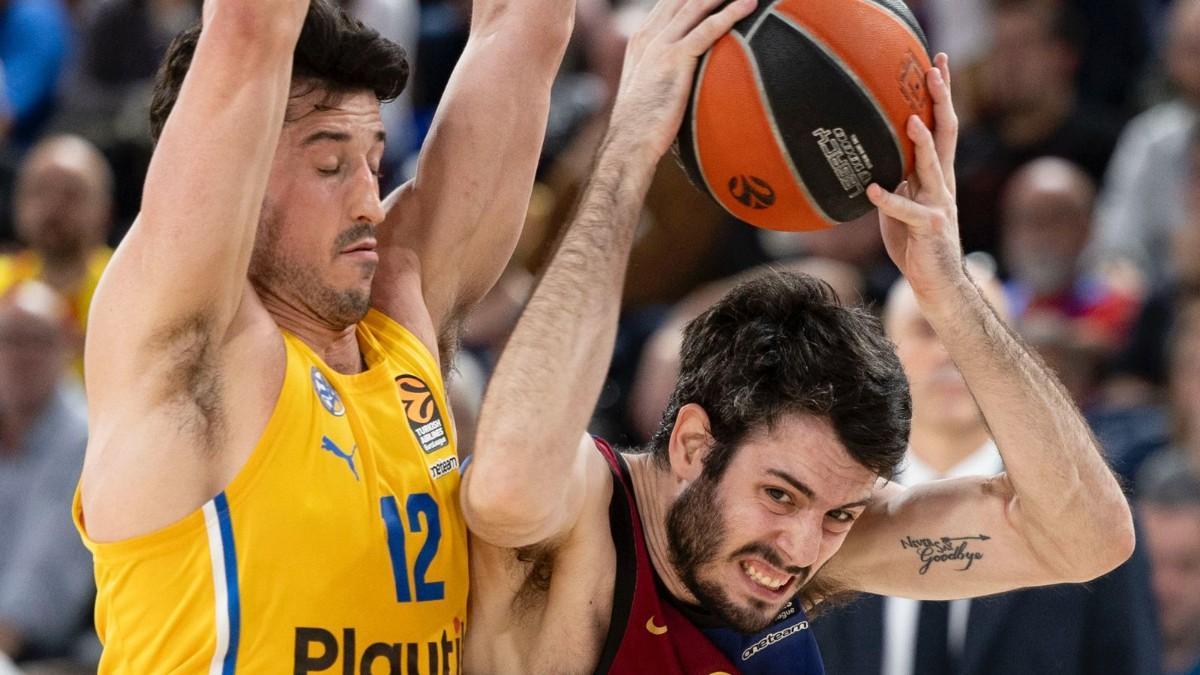Abrines, en un lance de partido junto a John DiBartolomeo