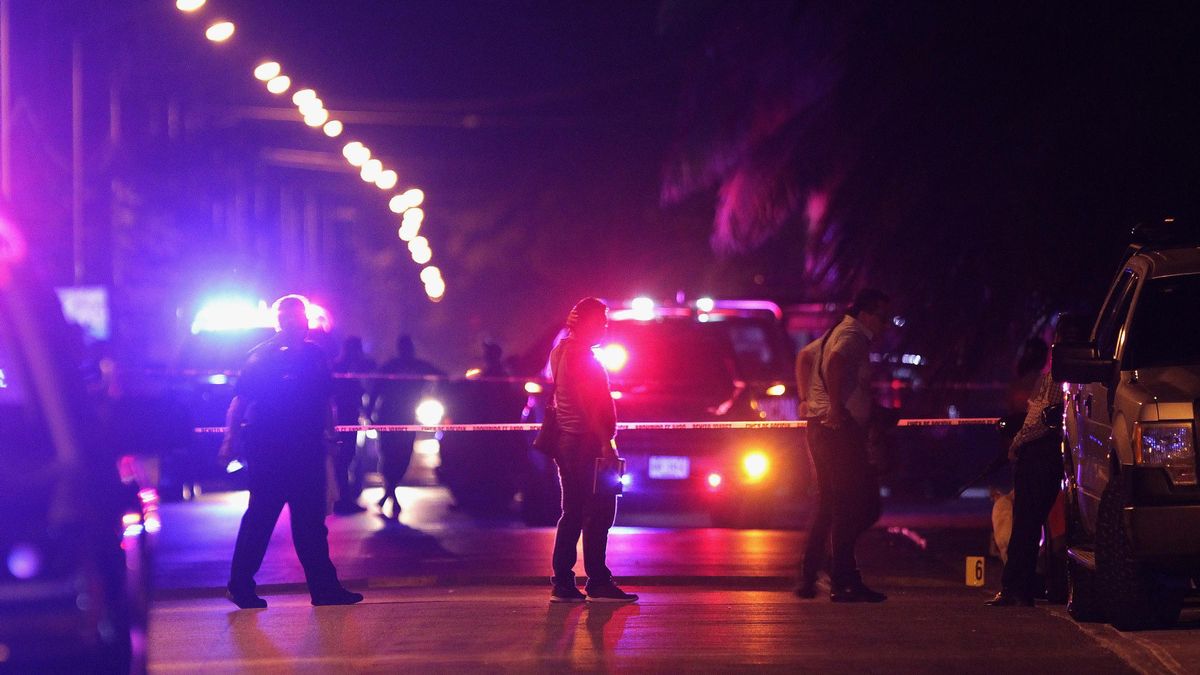 The police, at the scene of the murder. The police, at the scene of the murder.
