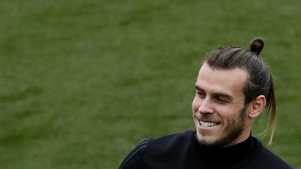 Bale sonríe durante el entrenamiento del Madrid este viernes en la ciudad deportiva de Valdebebas